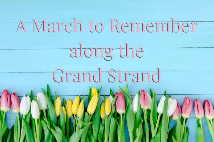blue wooden background with white, pink and yellow tulip buds on them with the words in pink saying "A March to Remember along the Grand Strand"
